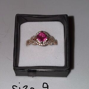 Radiant Pink Gemstone Ring with Sparkling Accents